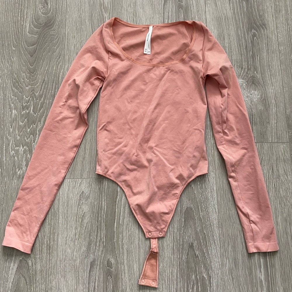 Babaton pink long sleeve bodysuit
